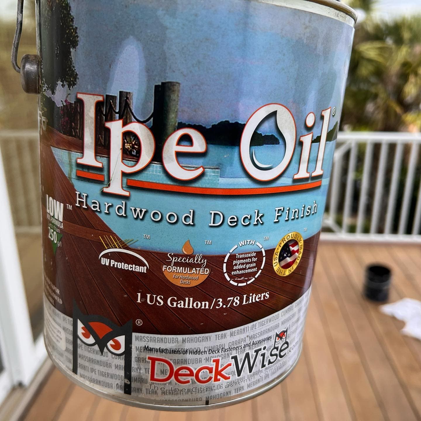 A one-gallon can labeled DeckWise Ipe Oil Hardwood Deck Finish.